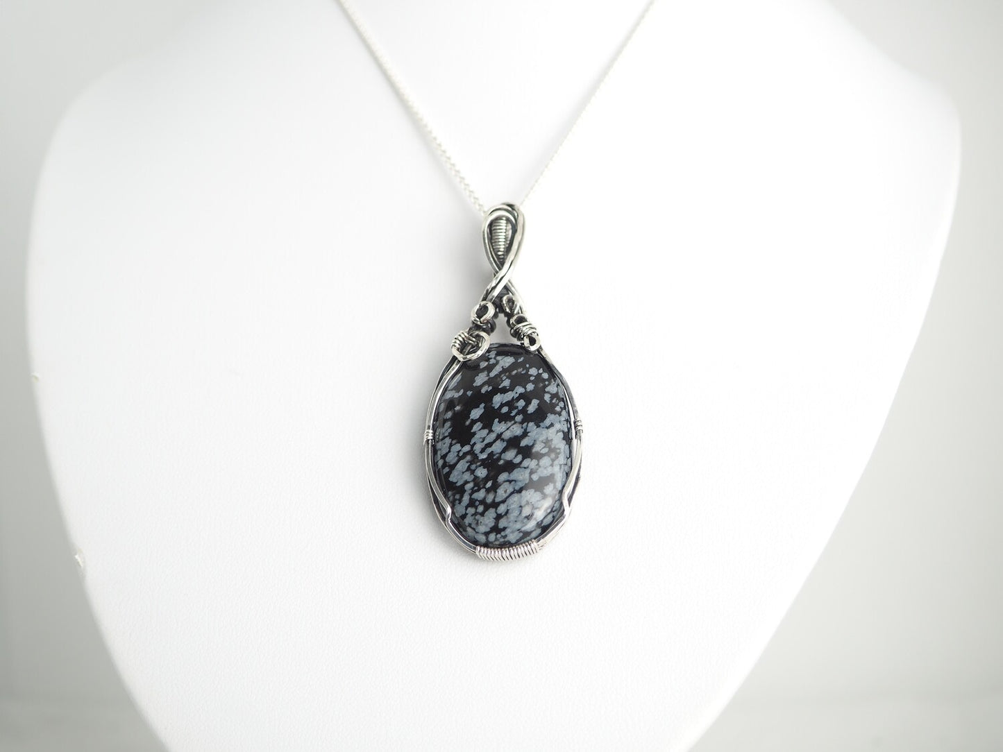Snowflake Obsidian wrapped in Sterling Silver and Oxidised.